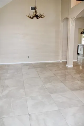 a view of a room with an empty space