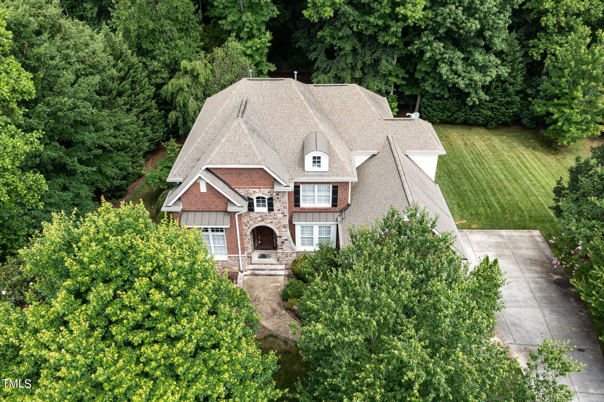 8319 La Matisse Road Raleigh, NC 27615 - Photo 2 of 46 A true beauty situated in short walking distance to Lafayette Village while surrounded by gorgeous trees.