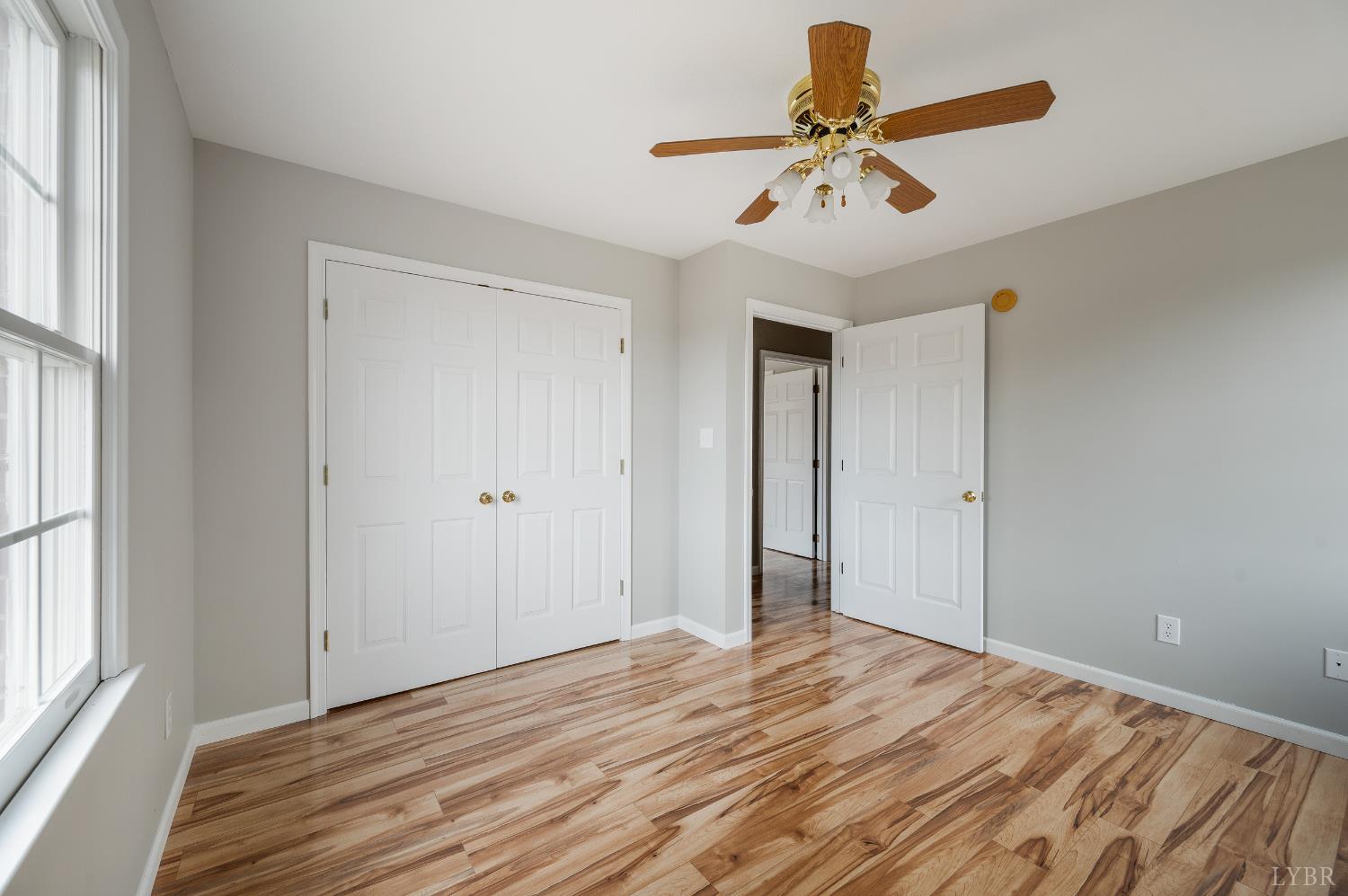2365 Police Tower Road Appomattox, VA 24522 - Photo 23 of 52 a view of empty room with wooden floor and fan