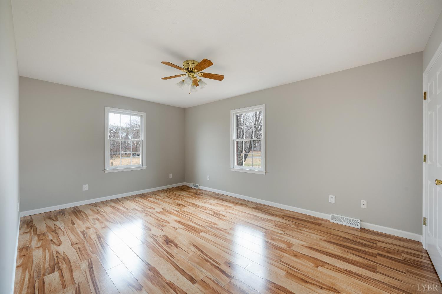 2365 Police Tower Road Appomattox, VA 24522 - Photo 24 of 52 a view of empty room with wooden floor and fan