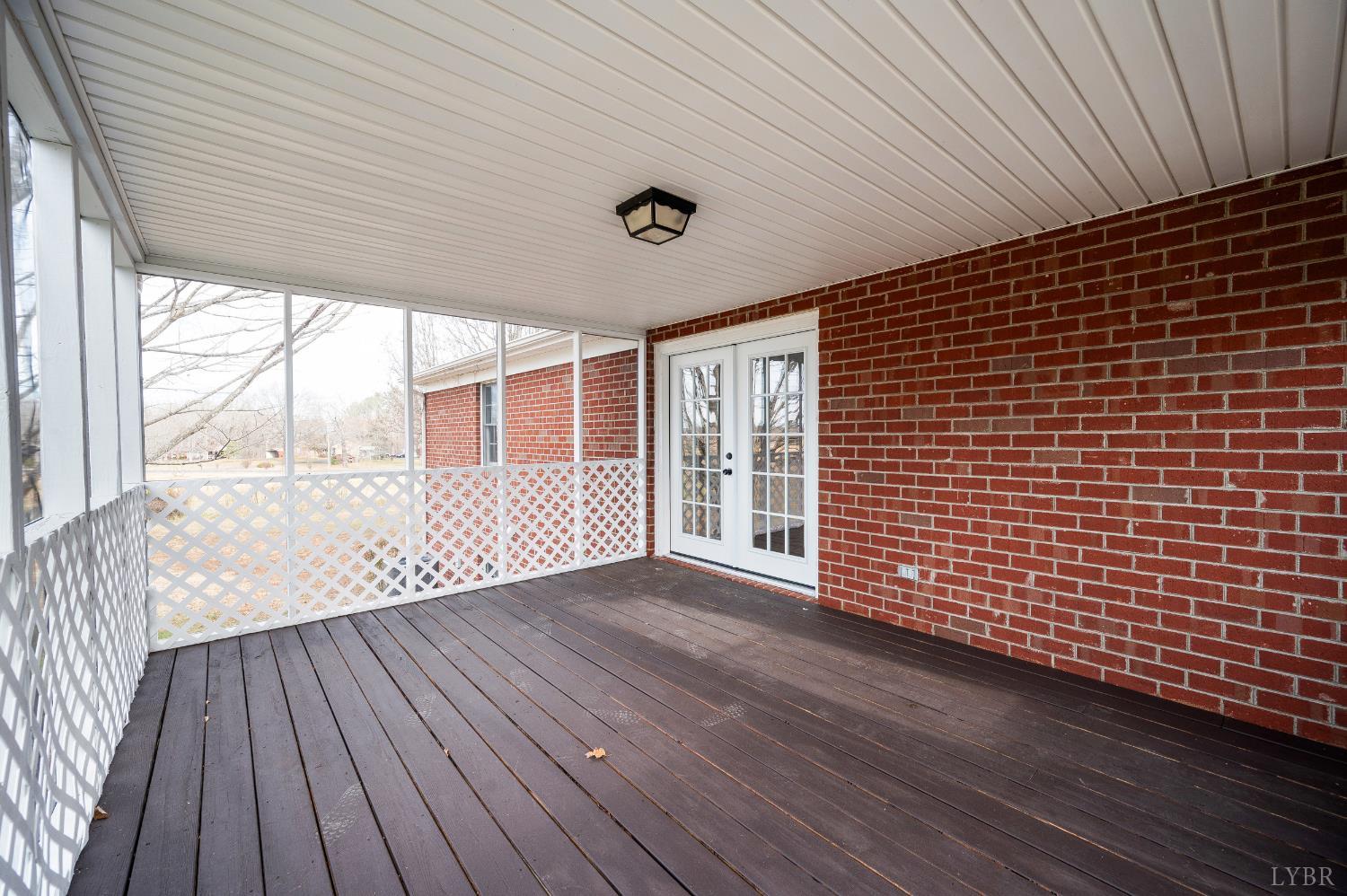 2365 Police Tower Road Appomattox, VA 24522 - Photo 31 of 52 a view of an empty room with wooden floor and a window