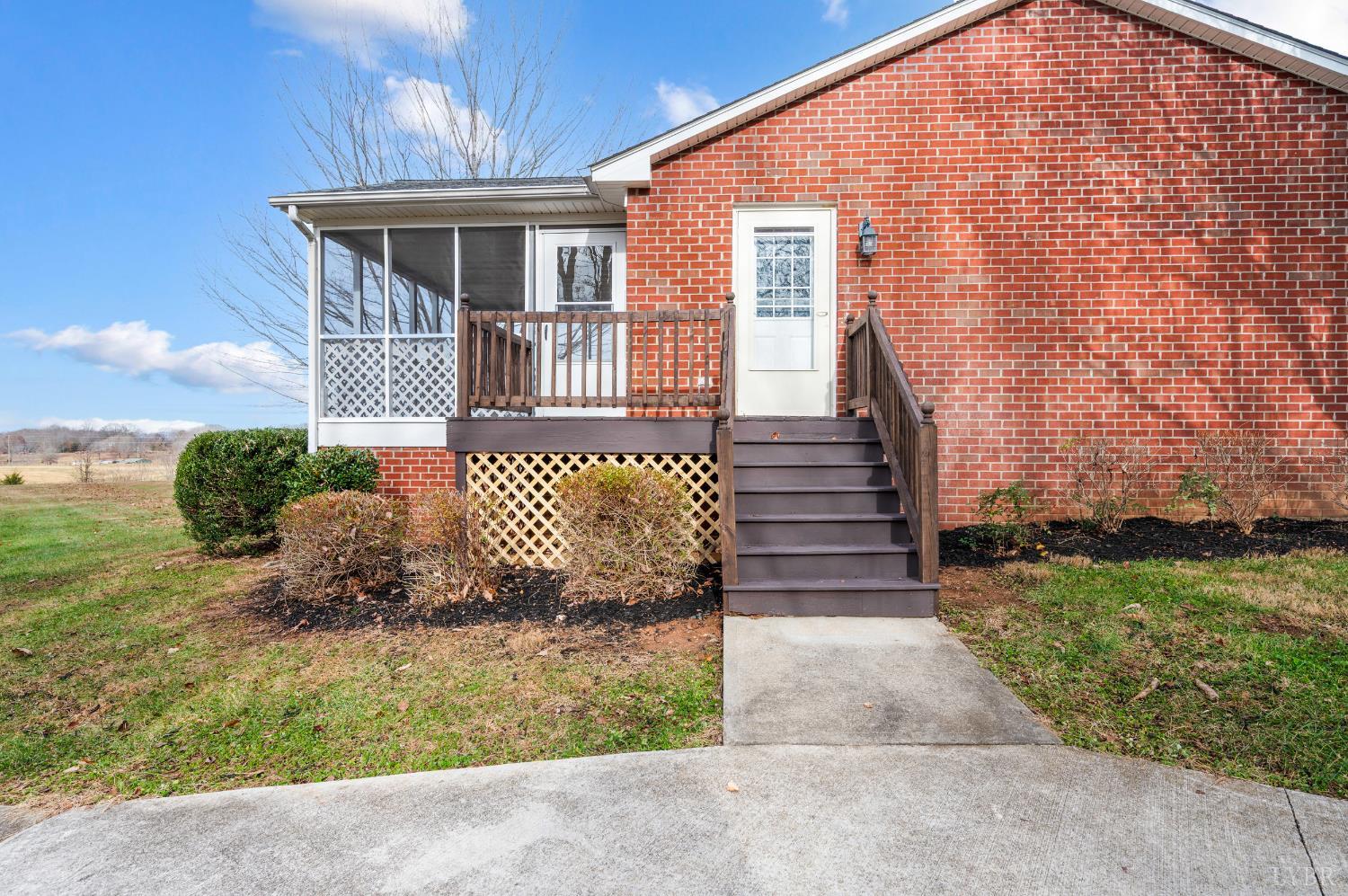 2365 Police Tower Road Appomattox, VA 24522 - Photo 35 of 52 a front view of a house with garden