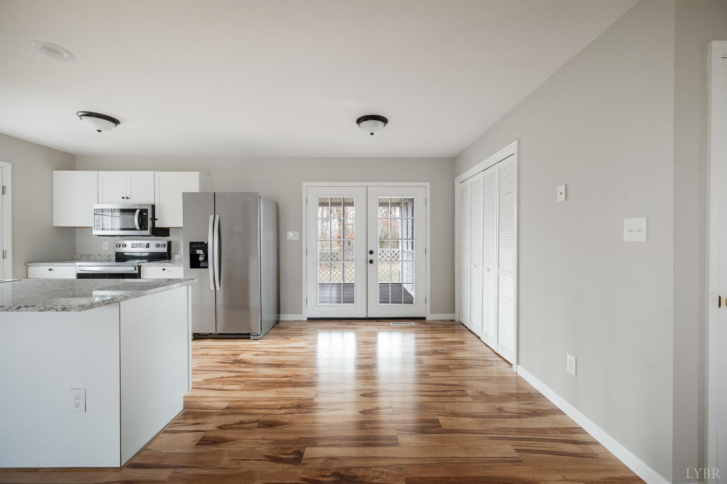 2365 Police Tower Road Appomattox, VA 24522 - Photo 10 of 52 a kitchen with stainless steel appliances a refrigerator and a stove top oven