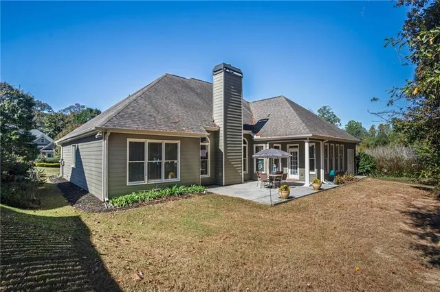 a front view of a house with a patio