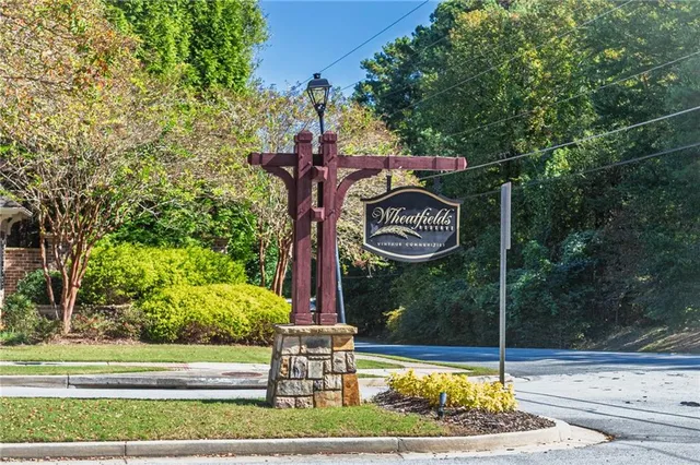 a sign that is on the side of a road