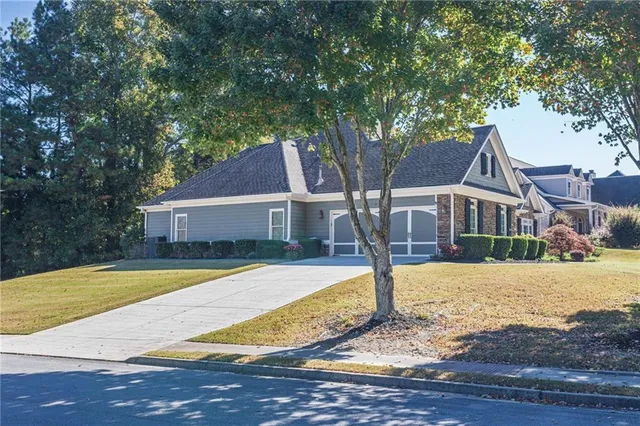 a front view of a house with swimming pool