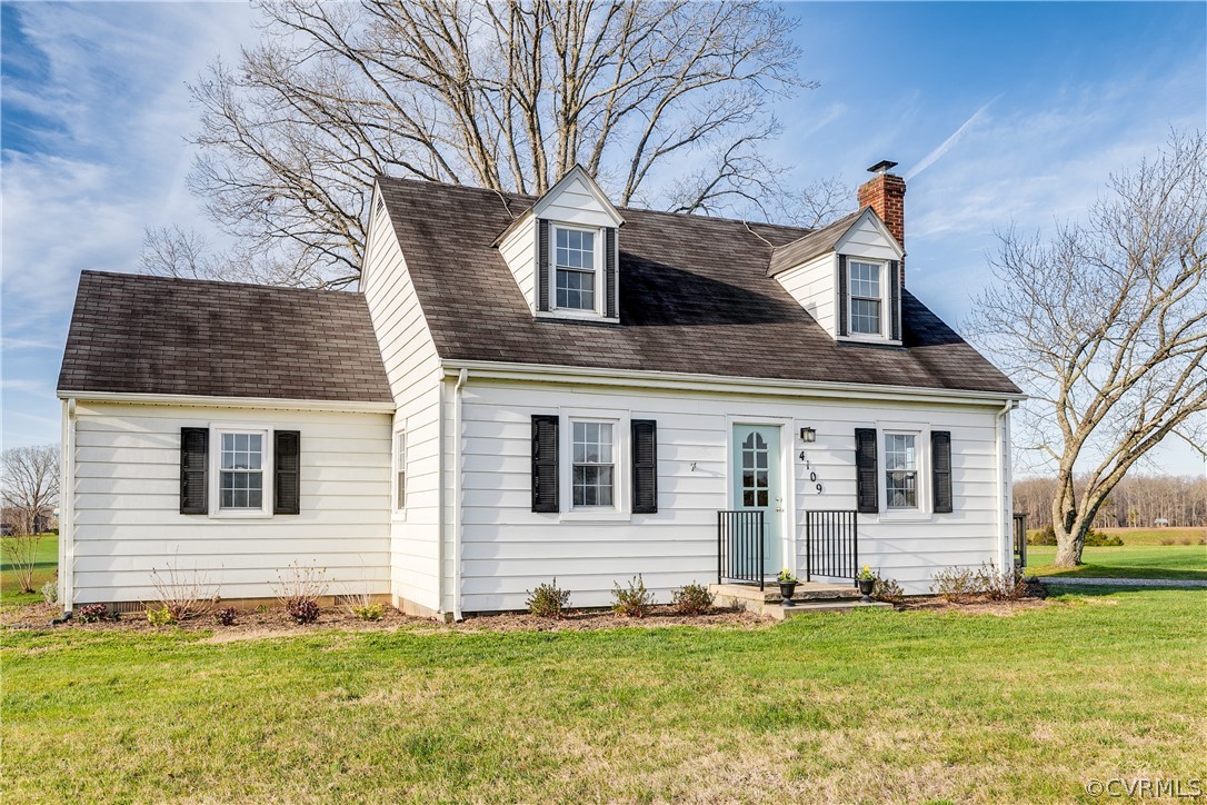 4109 Whitehall Road Sandy Hook, VA 23153 - Photo 1 of 28 a view of a house with a yard