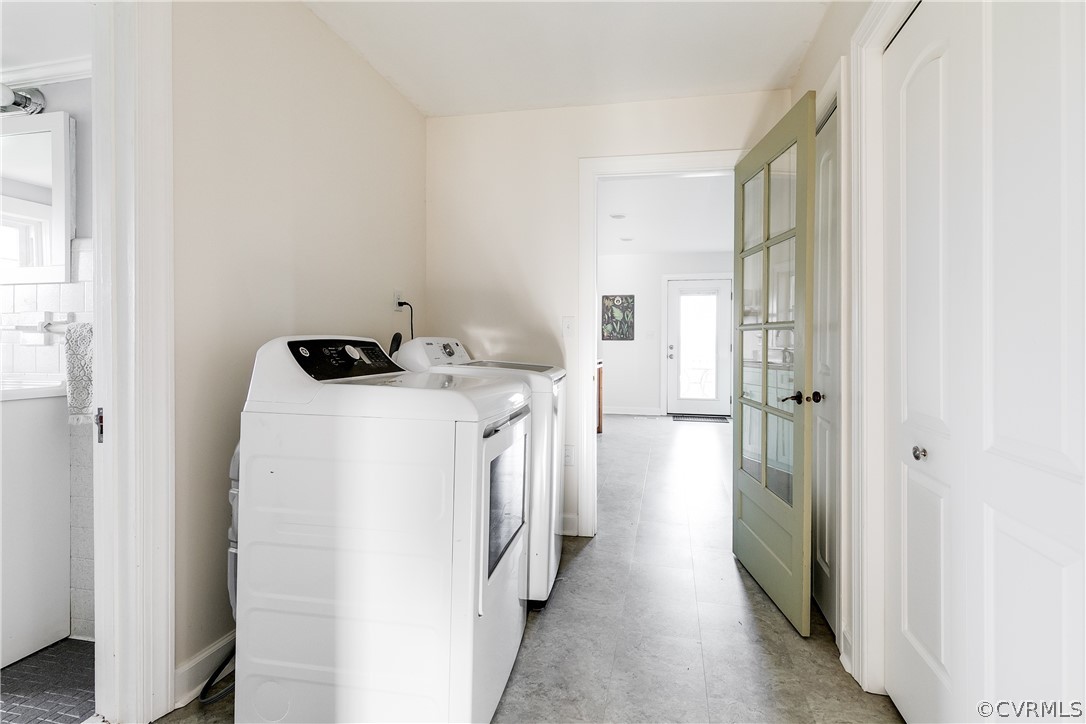 4109 Whitehall Road Sandy Hook, VA 23153 - Photo 11 of 28 a utility room with cabinets washer and dryer