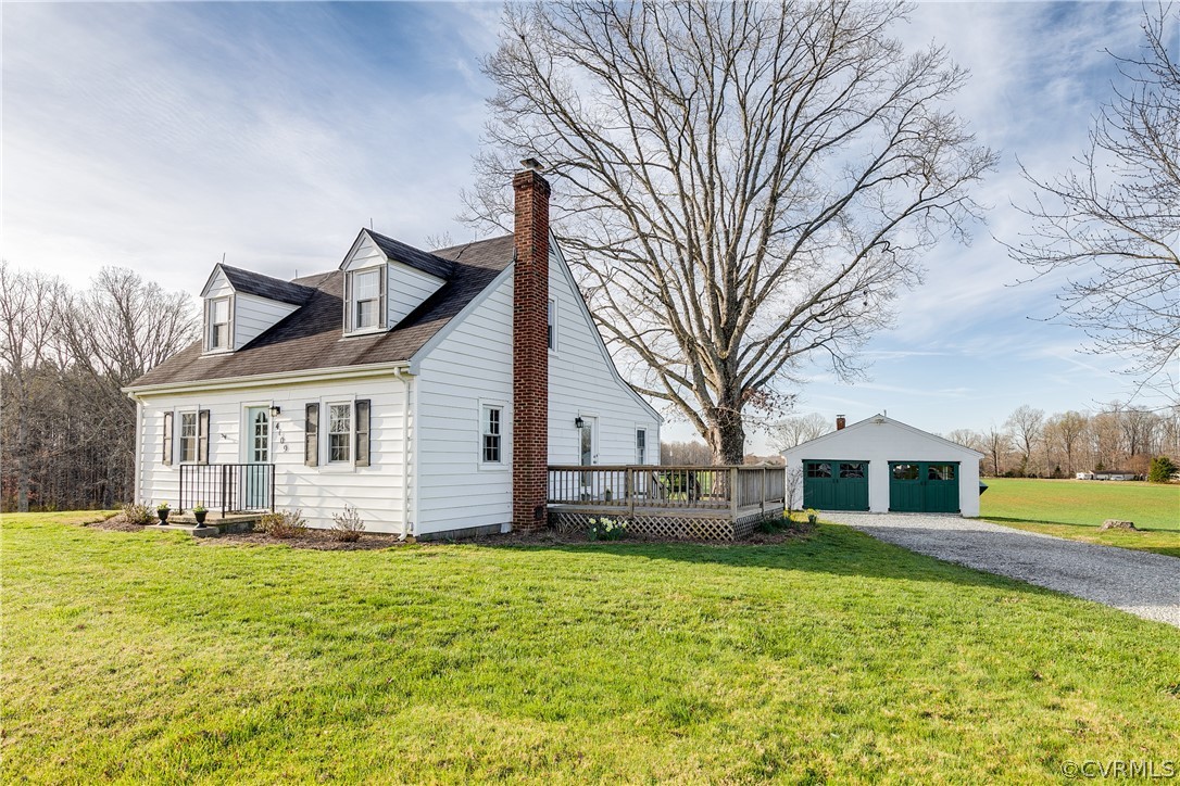 4109 Whitehall Road Sandy Hook, VA 23153 - Photo 2 of 28 a front view of house with yard and green space