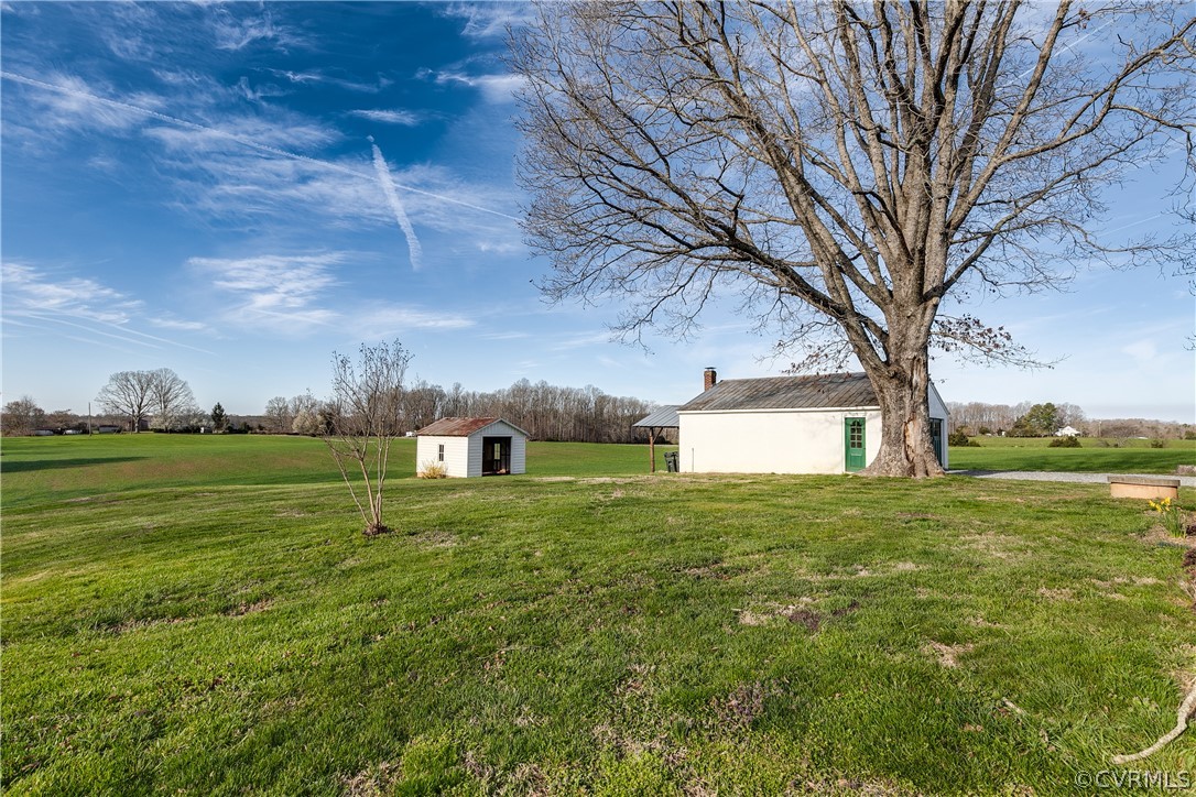 4109 Whitehall Road Sandy Hook, VA 23153 - Photo 27 of 28 a big yard with lots of green space