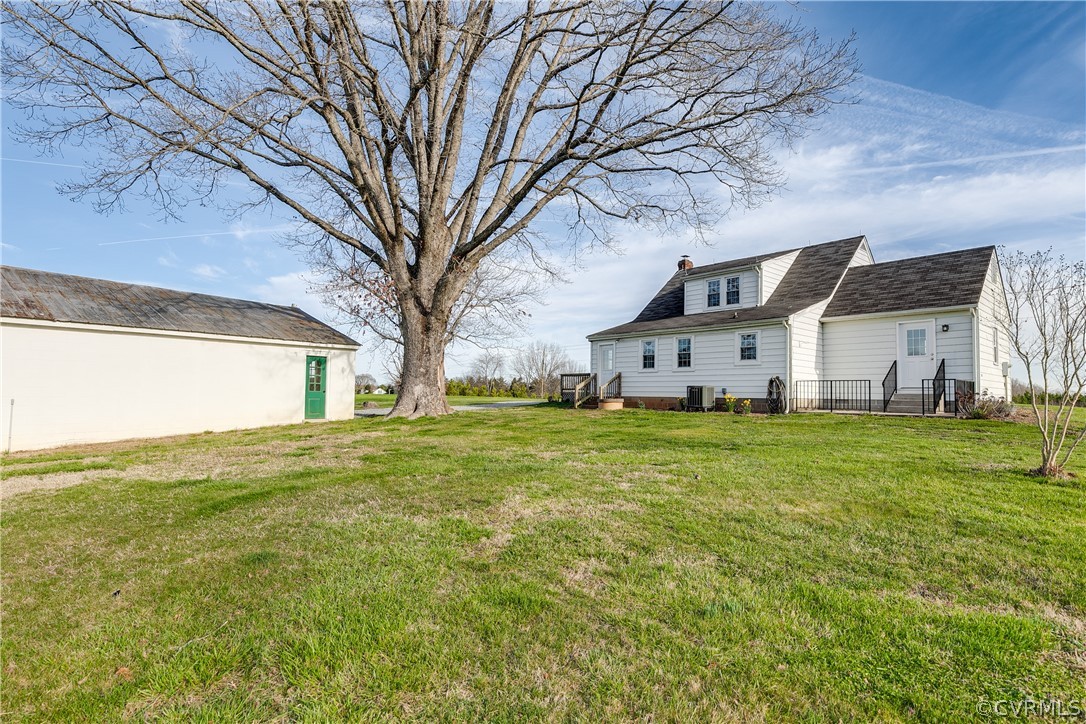 4109 Whitehall Road Sandy Hook, VA 23153 - Photo 28 of 28 a front view of house with yard