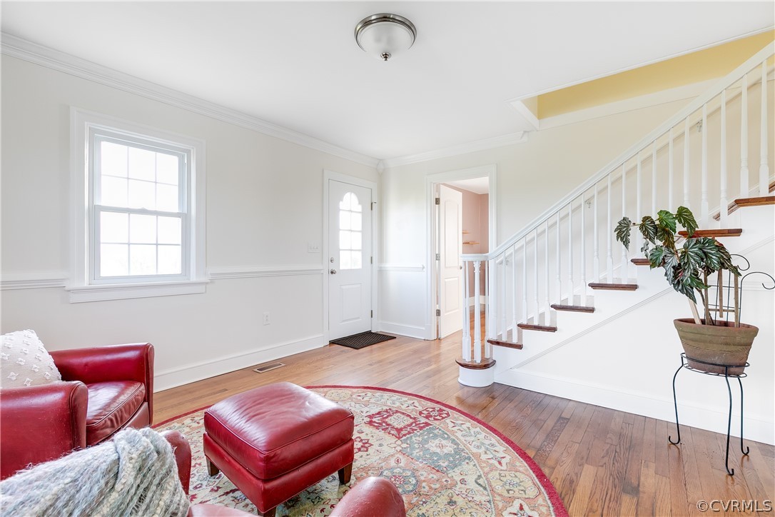 4109 Whitehall Road Sandy Hook, VA 23153 - Photo 4 of 28 a living room with furniture and wooden floor