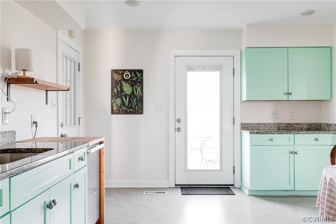 4109 Whitehall Road Sandy Hook, VA 23153 - Photo 7 of 28 a kitchen with a sink cabinets and a window