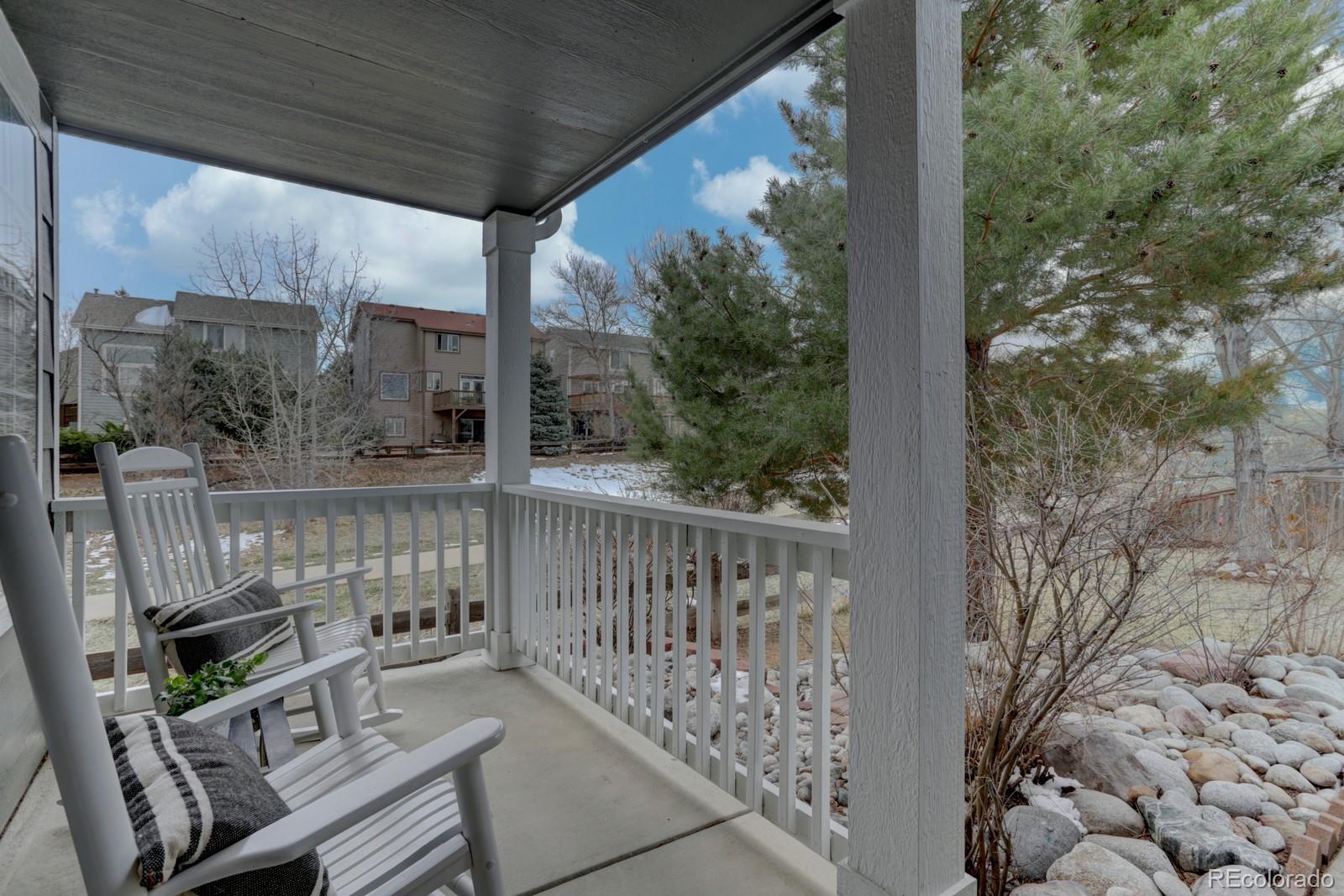 801 Riddlewood Lane Highlands Ranch, CO 80129 - Photo 2 of 40 a view of balcony with wooden floor
