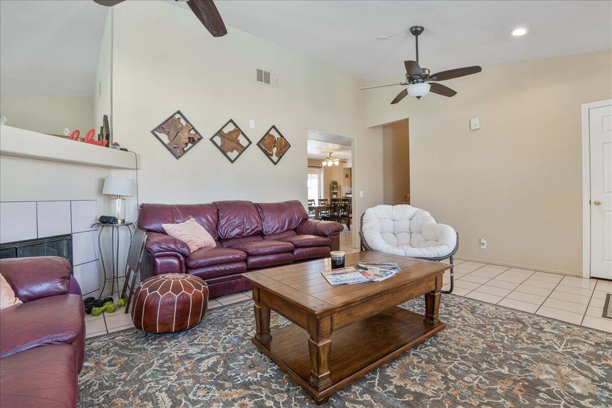 81033 Jamie Way Indio, CA 92201 - Photo 6 of 27 a living room with furniture and a rug