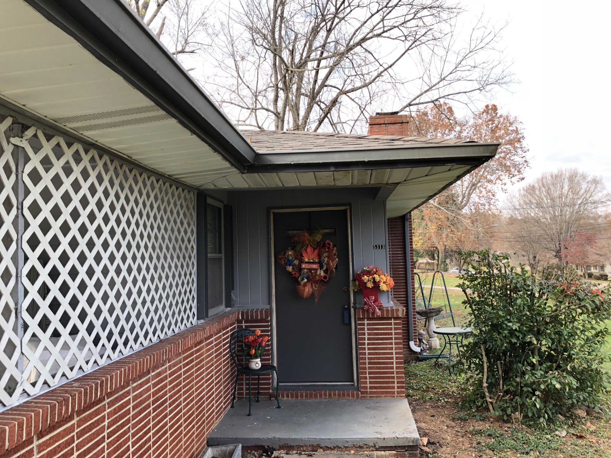 5313 Bluefield Road Knoxville, TN 37921 - Photo 11 of 18 a view of a porch with a bench