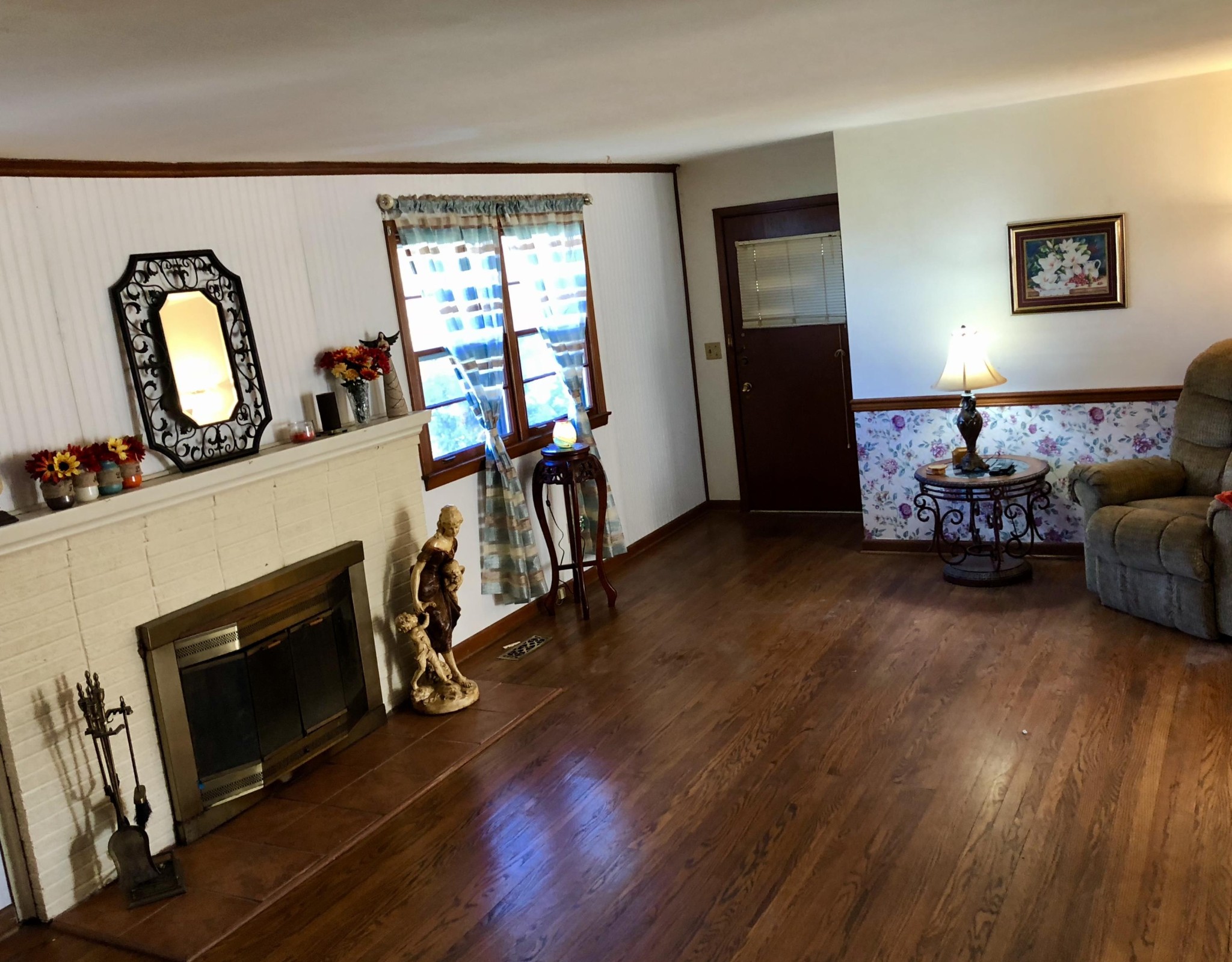 5313 Bluefield Road Knoxville, TN 37921 - Photo 3 of 18 a living room with furniture and a fireplace