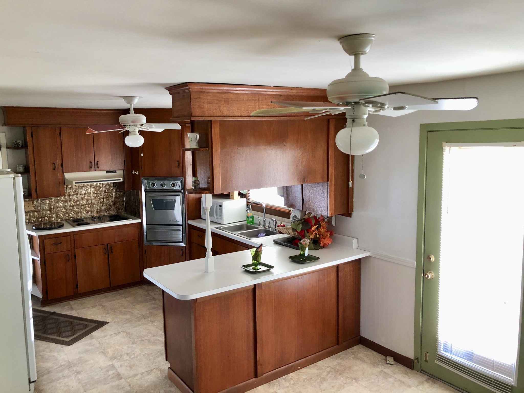 5313 Bluefield Road Knoxville, TN 37921 - Photo 5 of 18 a kitchen with stainless steel appliances granite countertop a sink and cabinets