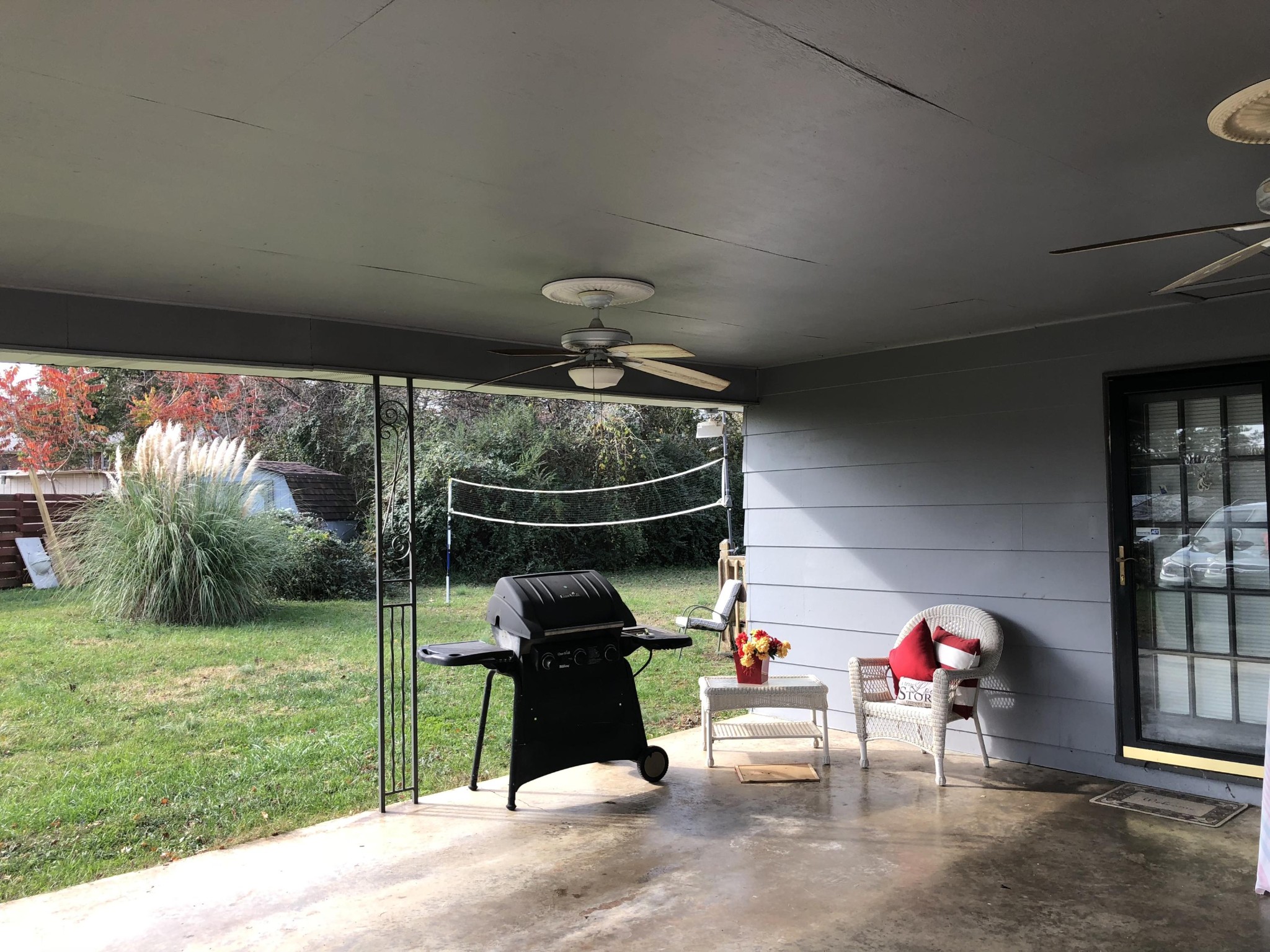5313 Bluefield Road Knoxville, TN 37921 - Photo 10 of 18 a view of a porch with furniture and garden