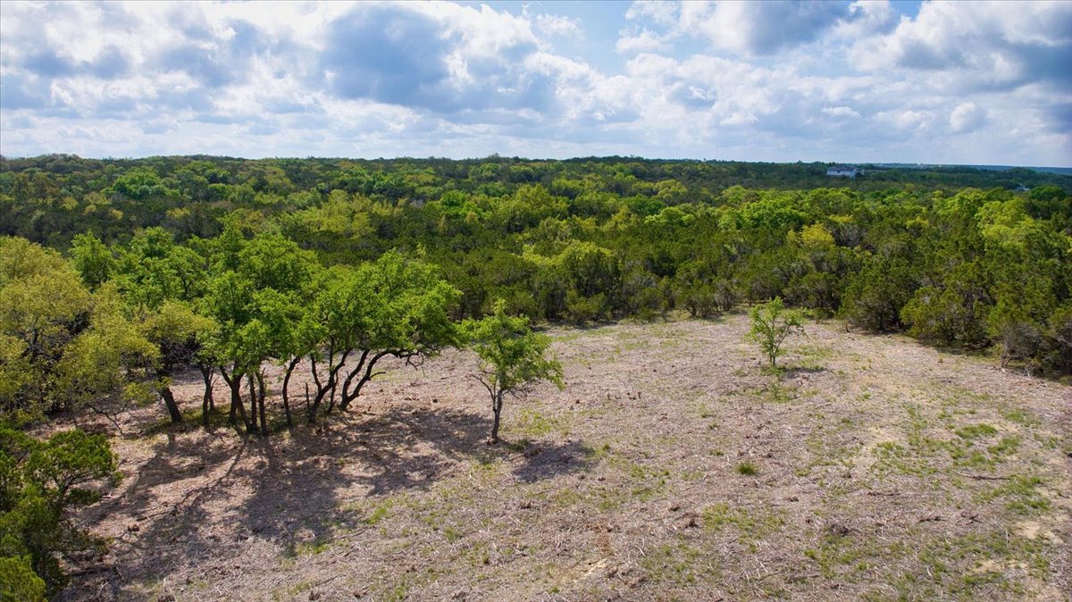 24369 Round Mountain Road, Unit 6 Leander, TX 78641 - Photo 9 of 28 View of landscape featuring a view of trees