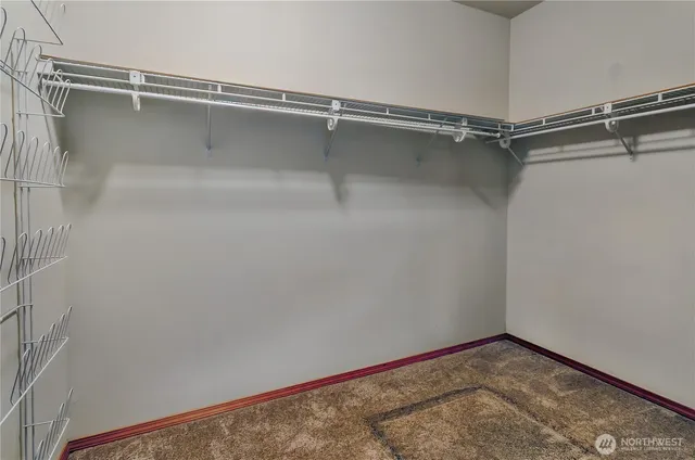 a view of a room with racks on the wall