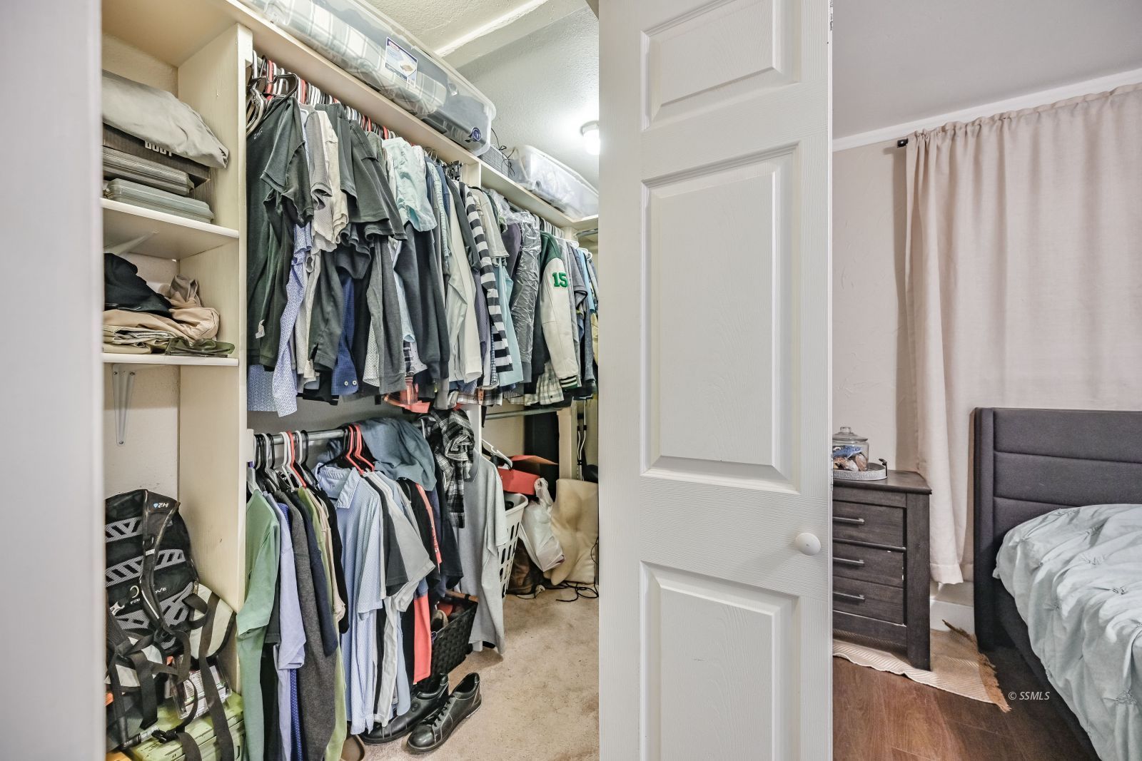1407 North Indian Wells Street Ridgecrest, CA 93555 - Photo 33 of 50 a view of walk in closet with clothes and shoes