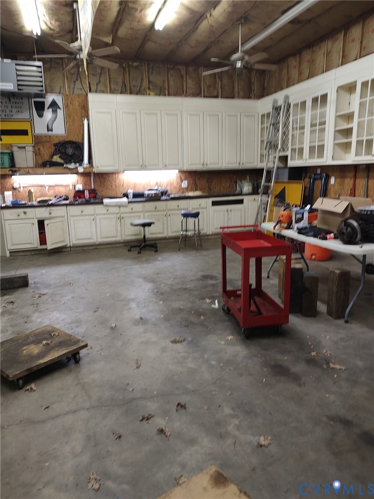 5475 Cold Harbor Road Mechanicsville, VA 23111 - Photo 27 of 29 a kitchen with table and chairs