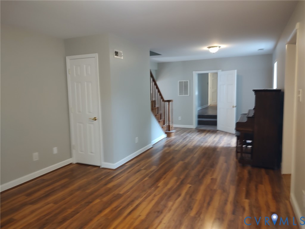 5475 Cold Harbor Road Mechanicsville, VA 23111 - Photo 4 of 29 a view of empty room with wooden floor and fan