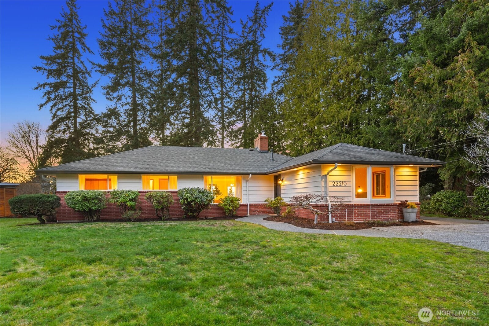 22210 96th Avenue West Edmonds, WA 98020 - Photo 1 of 35 a view of a house with a big yard potted plants and large tree