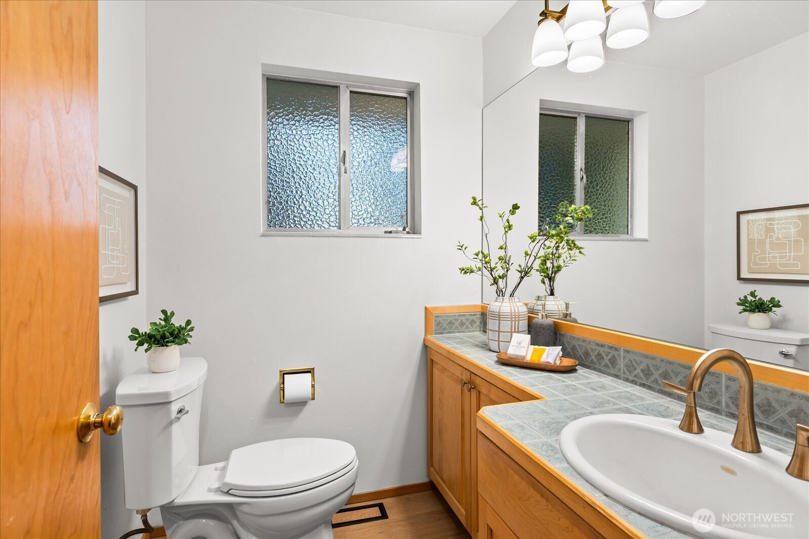 22210 96th Avenue West Edmonds, WA 98020 - Photo 22 of 35 a bathroom with a toilet sink and mirror