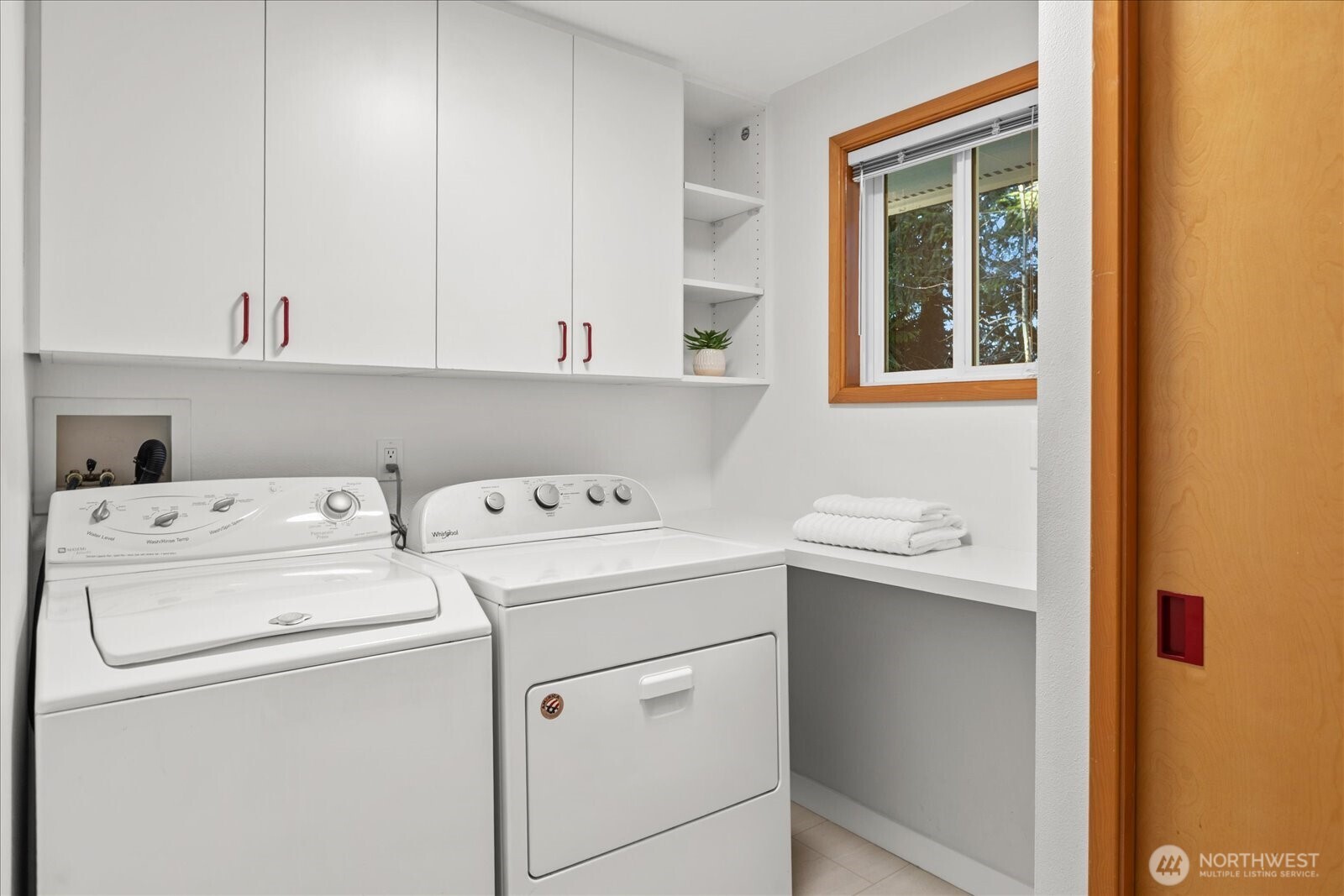22210 96th Avenue West Edmonds, WA 98020 - Photo 23 of 35 a view of storage and utility room with washer and dryer