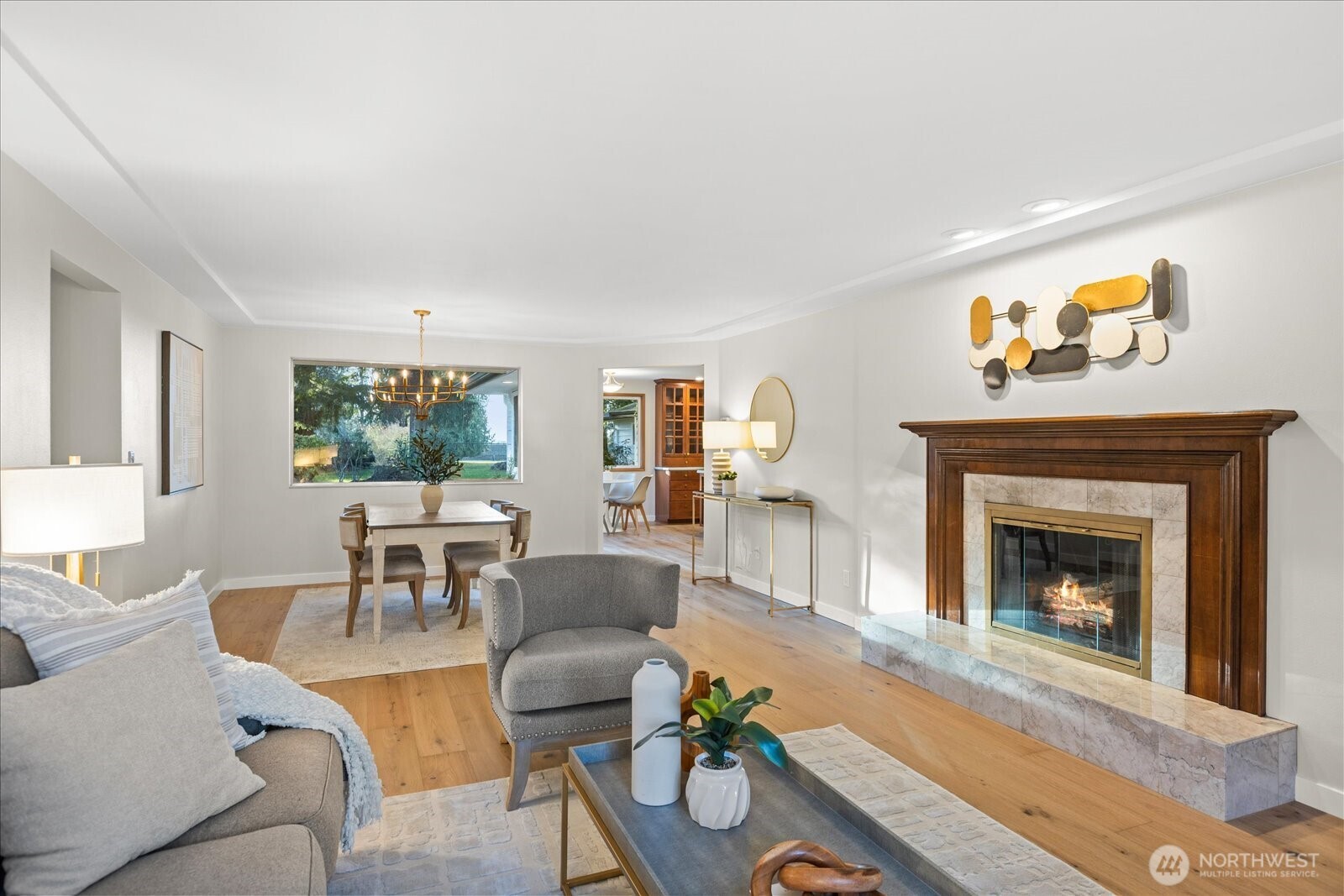 22210 96th Avenue West Edmonds, WA 98020 - Photo 4 of 35 a living room with furniture a window and a fireplace