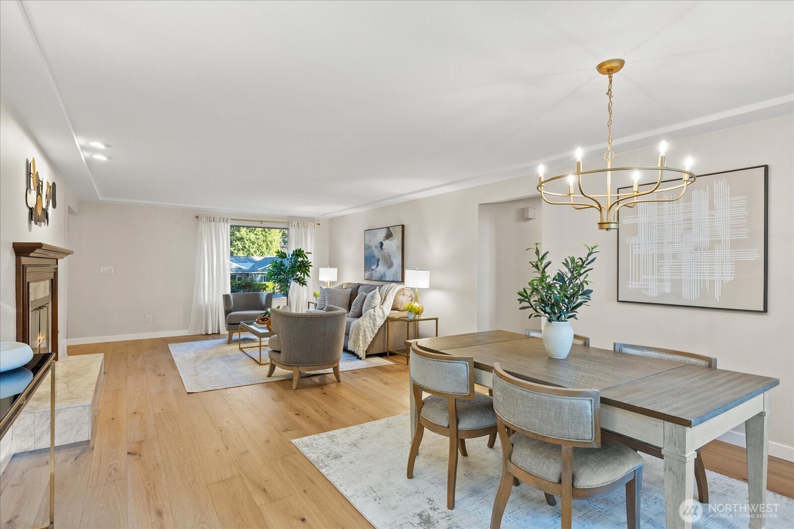 22210 96th Avenue West Edmonds, WA 98020 - Photo 5 of 35 a view of a dining room with furniture and wooden floor