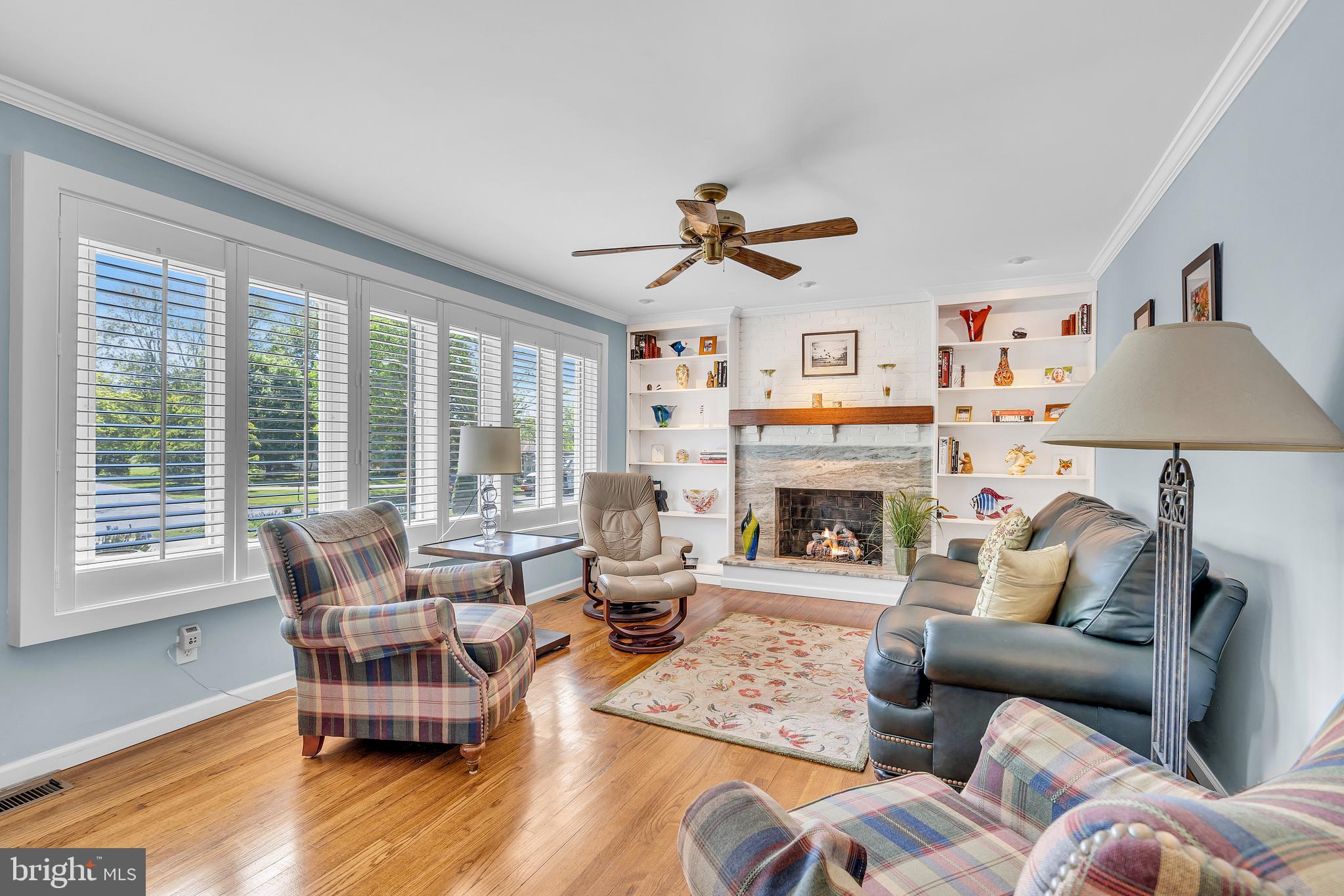 6 Park Road Mount Holly, NJ 08060 - Photo 11 of 58 a living room with furniture a fireplace and a large window