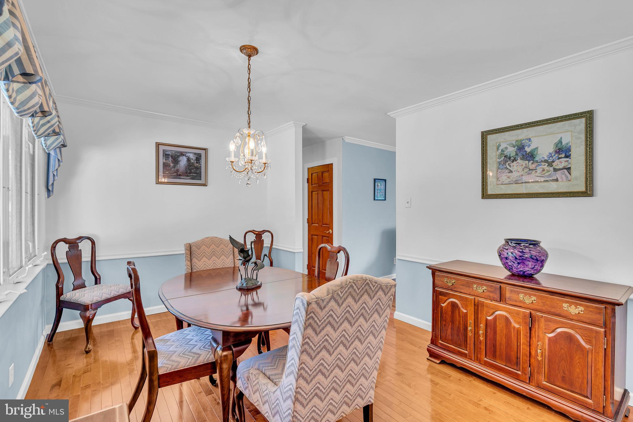 6 Park Road Mount Holly, NJ 08060 - Photo 16 of 58 a view of a dining room with furniture and chandelier