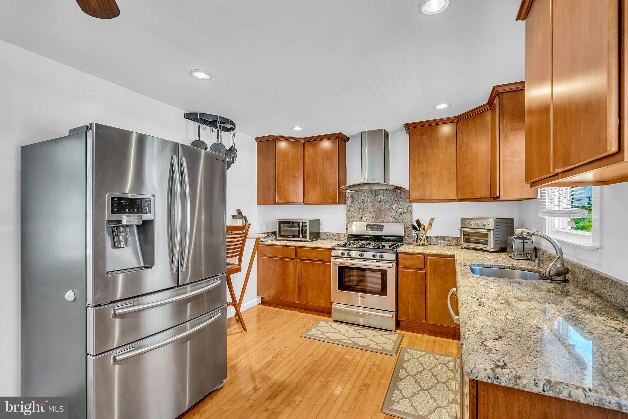 6 Park Road Mount Holly, NJ 08060 - Photo 18 of 58 a kitchen with granite countertop stainless steel appliances a refrigerator stove top oven and sink