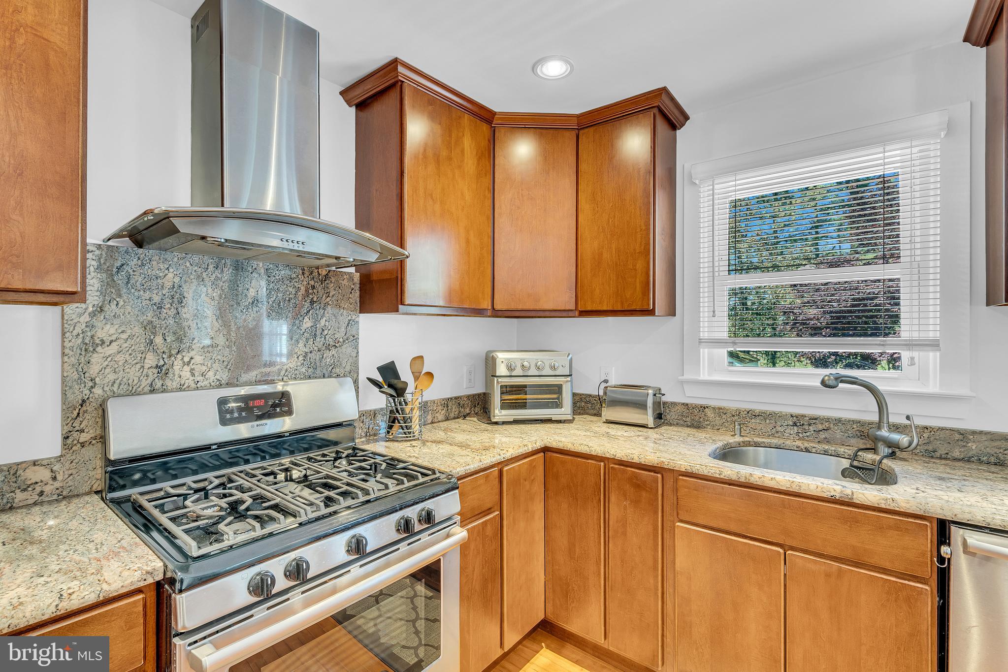 6 Park Road Mount Holly, NJ 08060 - Photo 28 of 58 a kitchen with sink a stove and a window