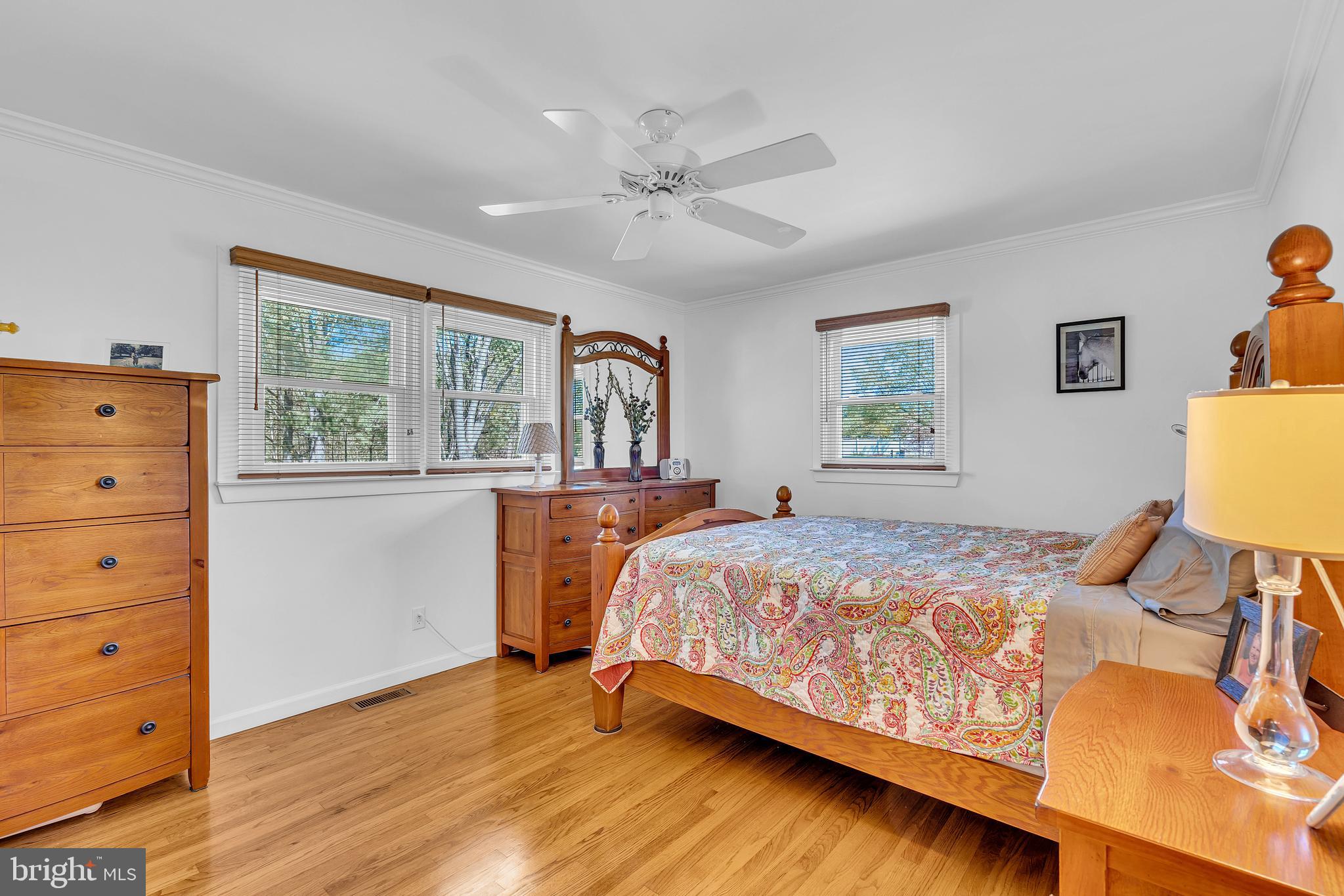 6 Park Road Mount Holly, NJ 08060 - Photo 32 of 58 a bedroom with a bed and wooden floor