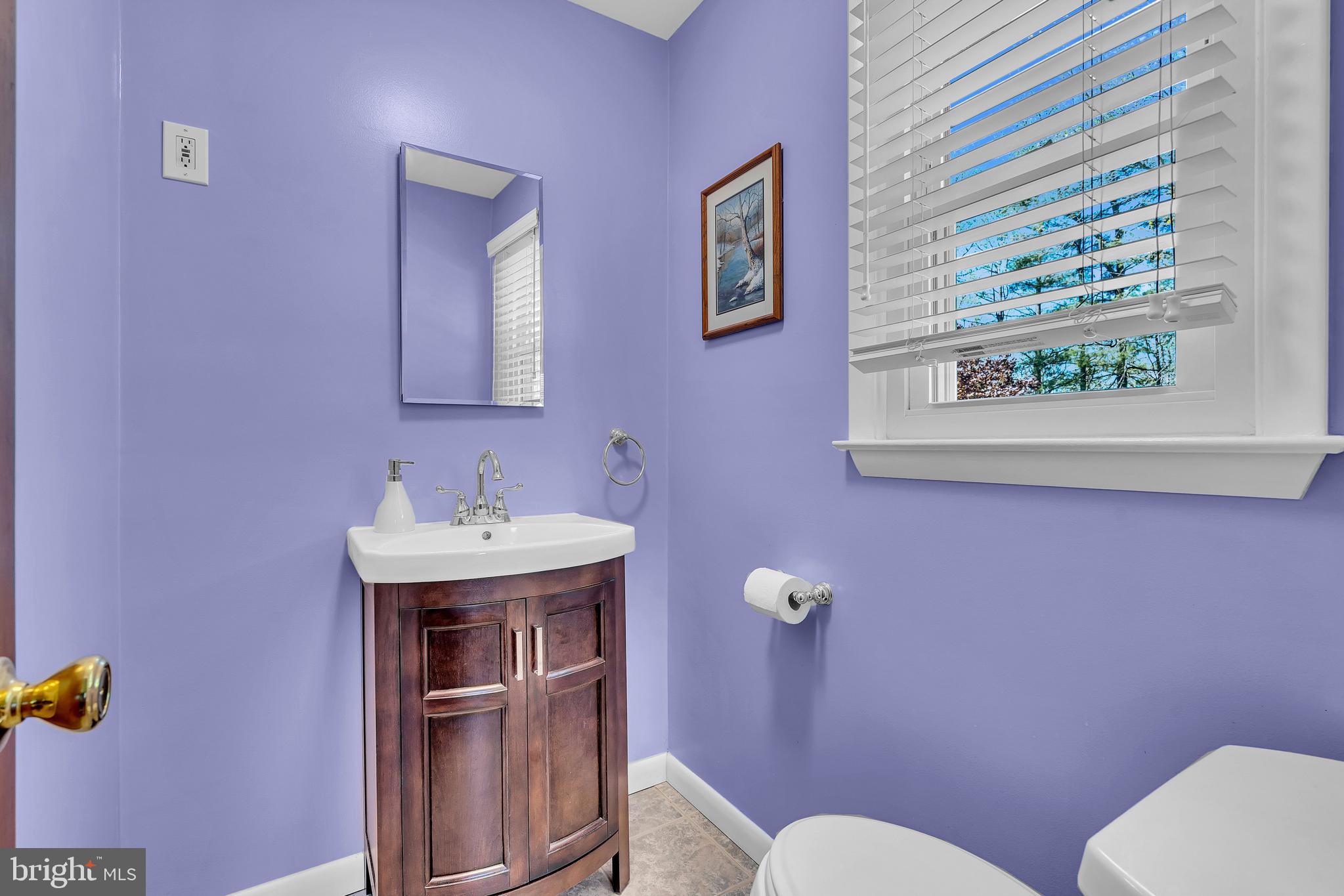6 Park Road Mount Holly, NJ 08060 - Photo 34 of 58 a bathroom with a sink a toilet and mirror