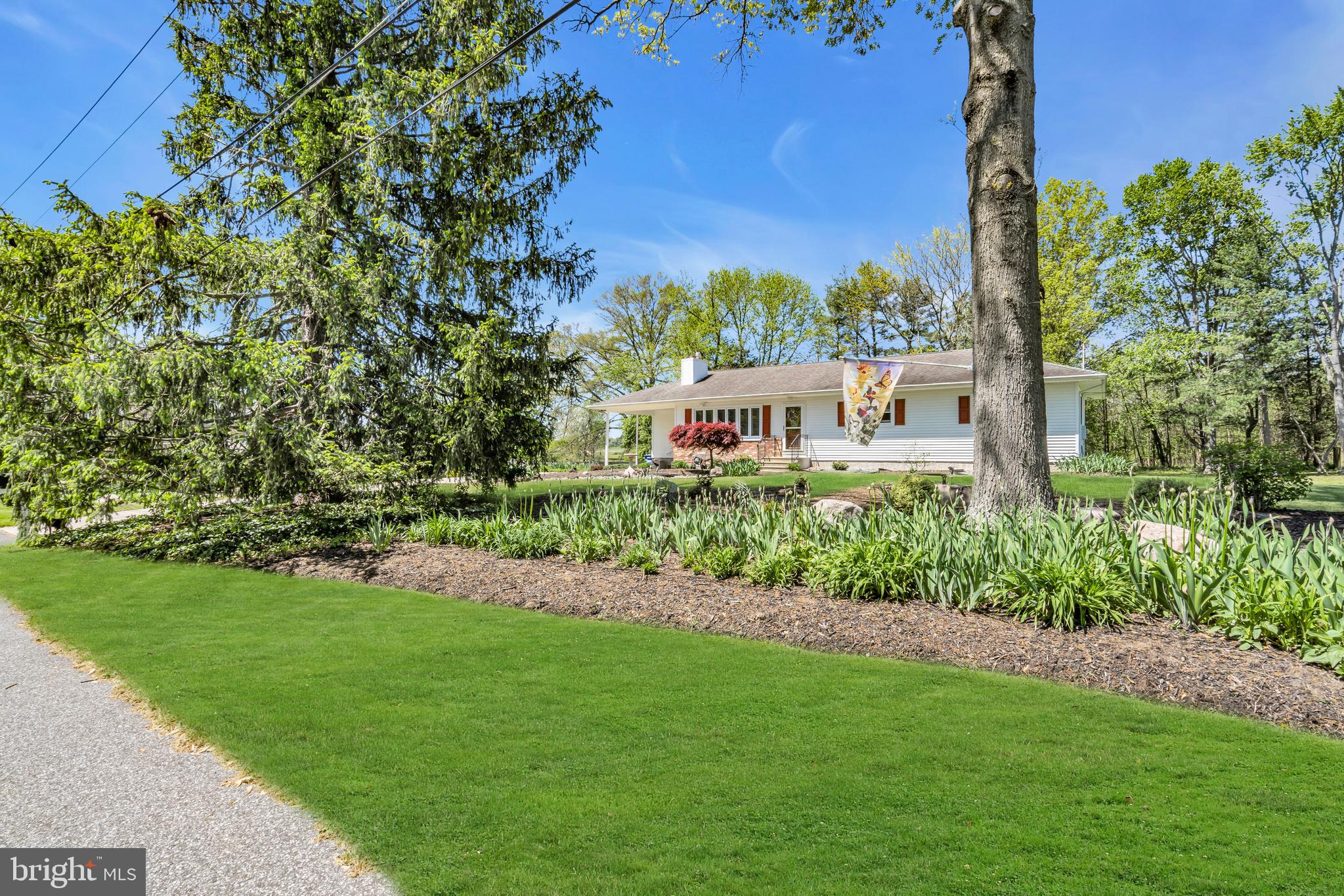 6 Park Road Mount Holly, NJ 08060 - Photo 58 of 58 a view of a garden with a building in the background