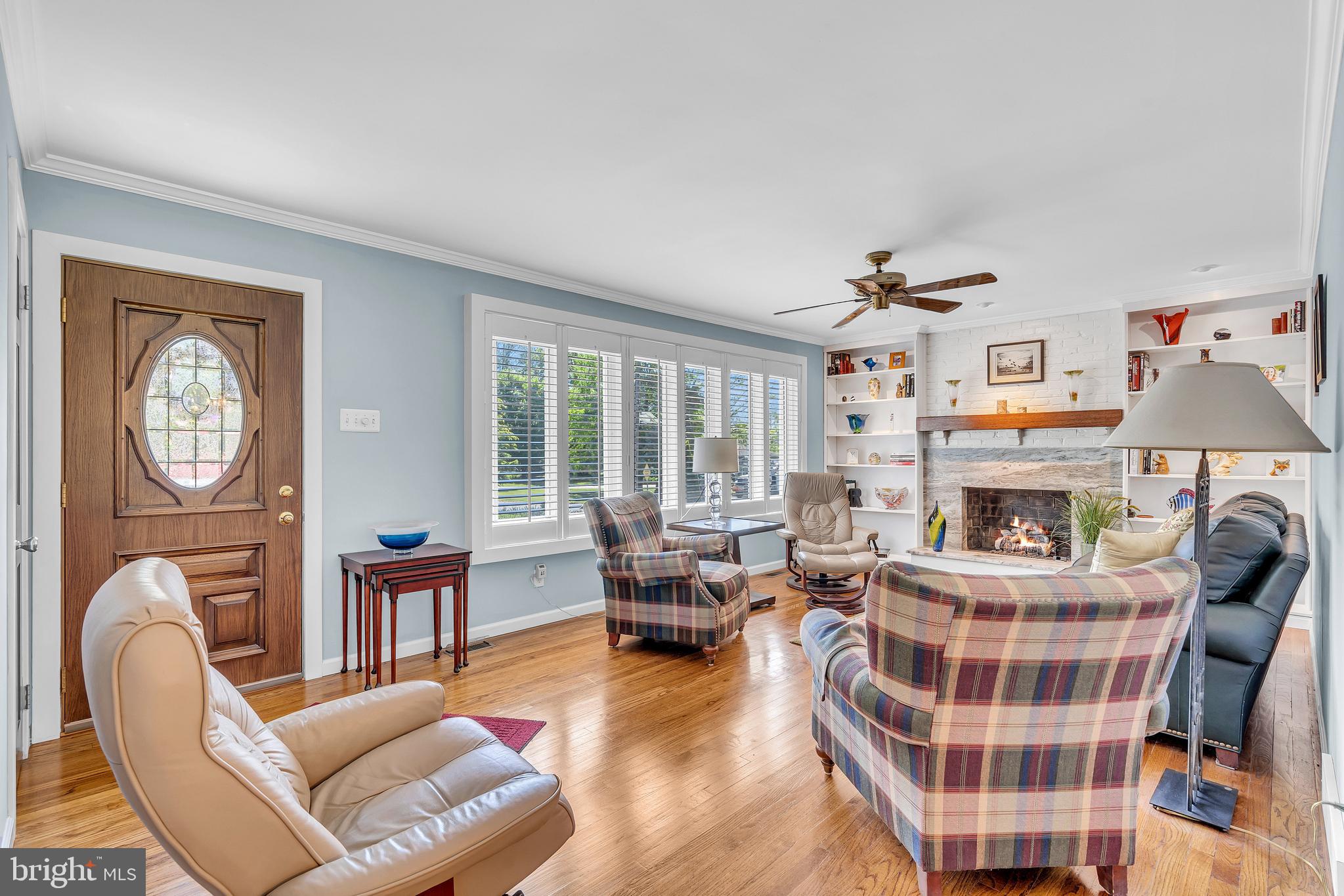6 Park Road Mount Holly, NJ 08060 - Photo 10 of 58 a living room with furniture a fireplace and a large window