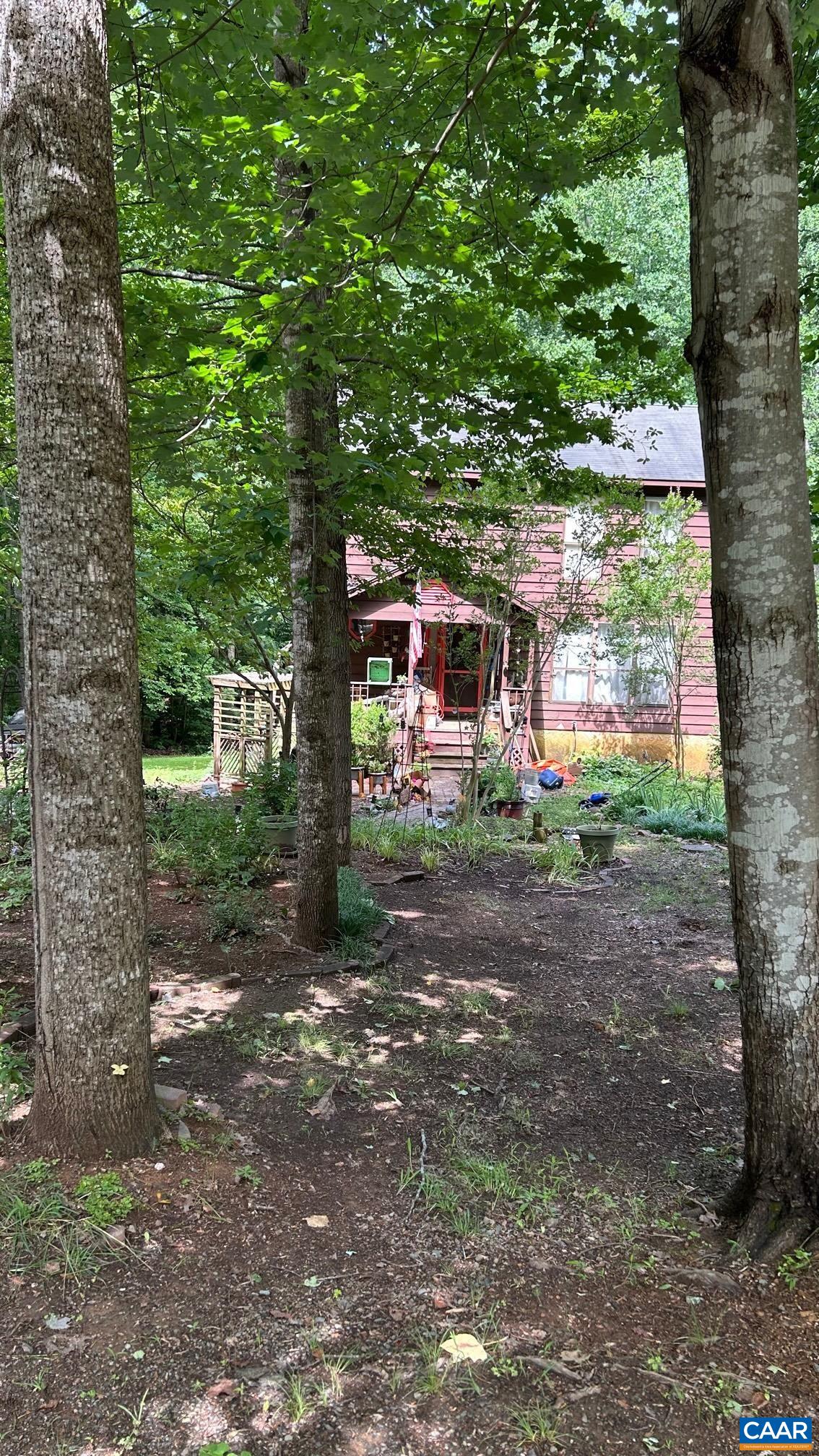15 Tanglewood Road Palmyra, VA 22963 - Photo 3 of 3 a backyard of a house with lots of green space