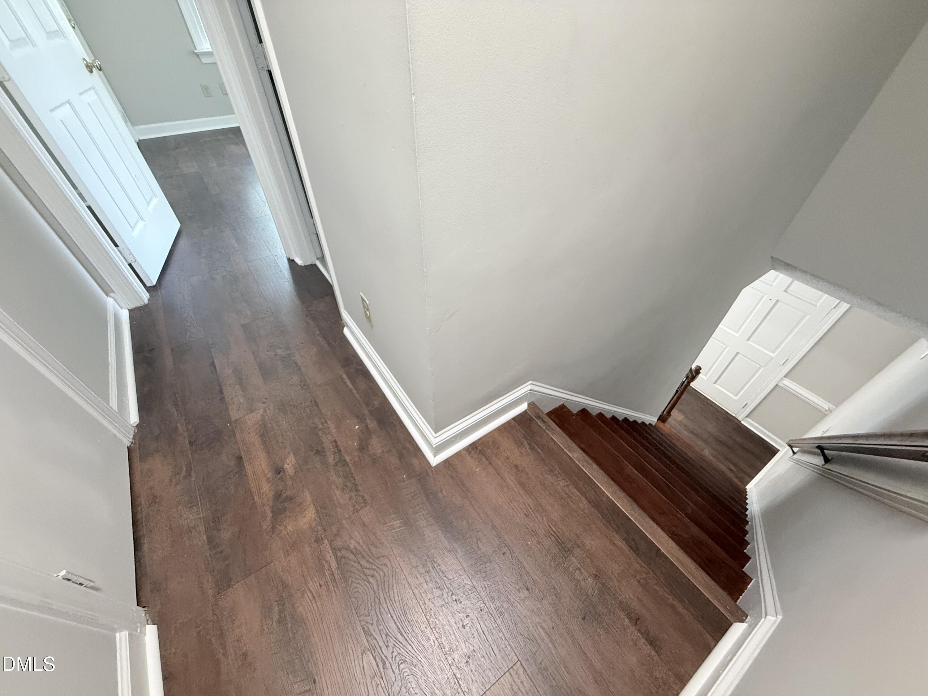 2900 Broadlands Drive Raleigh, NC 27604 - Photo 45 of 60 a view of an empty room with wooden floor