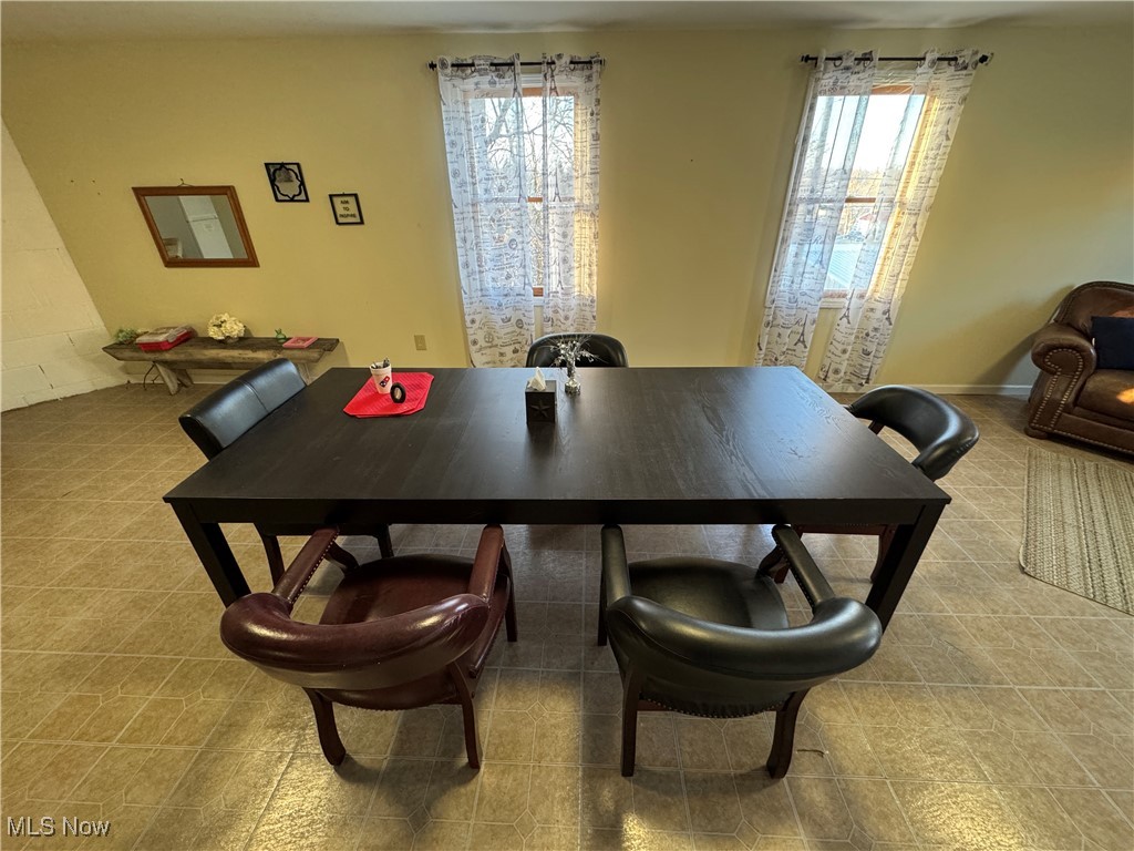 152 East Main Street Barnesville, OH 43713 - Photo 24 of 48 Dining room featuring healthy amount of natural light