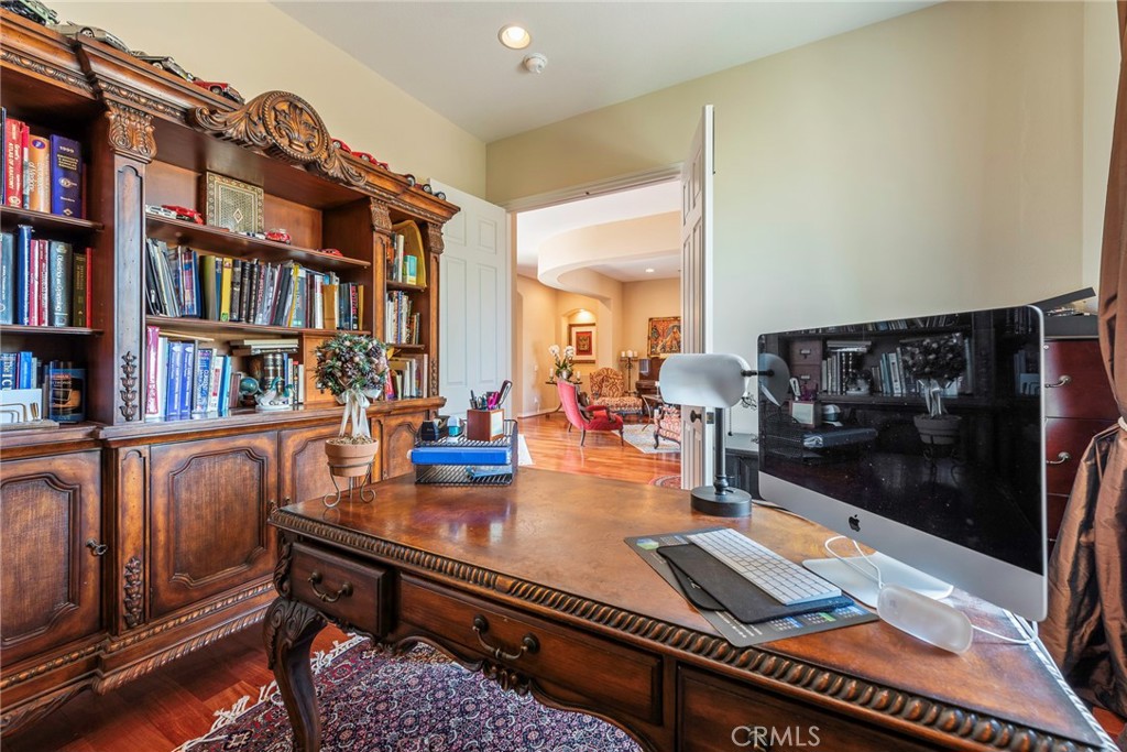 7940 Choi Drive Riverside, CA 92506 - Photo 14 of 56 a living room with furniture and a book shelf