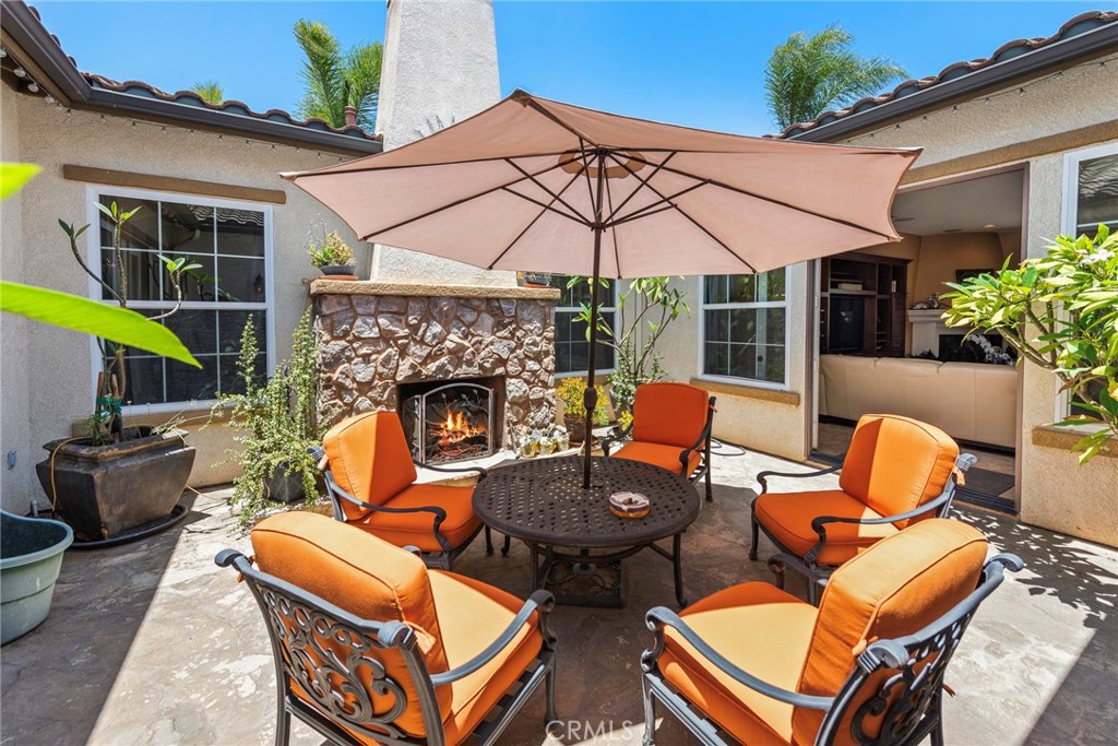 7940 Choi Drive Riverside, CA 92506 - Photo 16 of 56 a backyard of a house with seating space