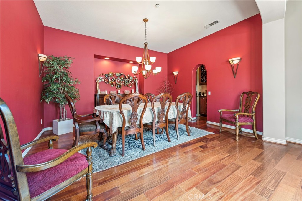7940 Choi Drive Riverside, CA 92506 - Photo 17 of 56 a view of a dining room with furniture and chandelier