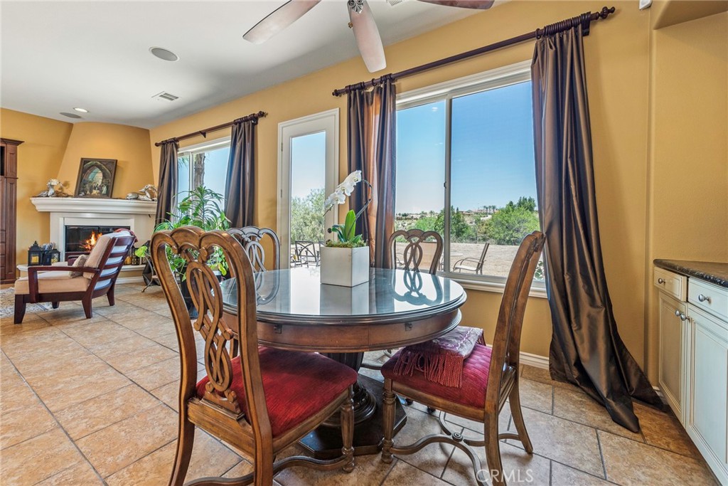 7940 Choi Drive Riverside, CA 92506 - Photo 23 of 56 a view of a dining room with furniture and a window