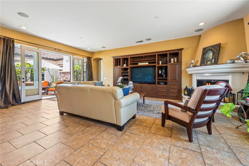 7940 Choi Drive Riverside, CA 92506 - Photo 24 of 56 a bedroom with furniture and large windows