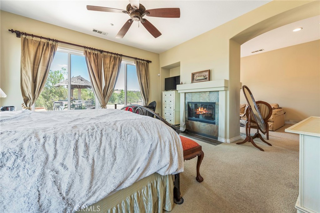 7940 Choi Drive Riverside, CA 92506 - Photo 32 of 56 a bed sitting in a room next to a window